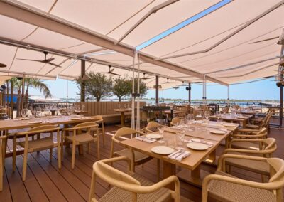 Fango restaurant terrace lounge with tables and chairs